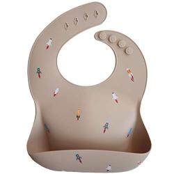 Mushie Silicone Baby Bib | Adjustable Fit Waterproof Bibs (Rocket Ship)