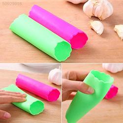 FidgetKute E670 Useful Professional Kitchenware Cookware House Magic Silicone Garlic Peeler Show One Size