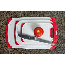 CC Boards 3-Piece Nonslip Cutting Board Set: Red and white plastic kitchen carving boards, each with juice groove and nonskid handle; dishwasher safe